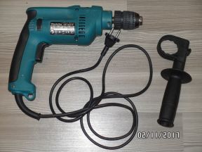 Ударная дрель Makita HP1621F