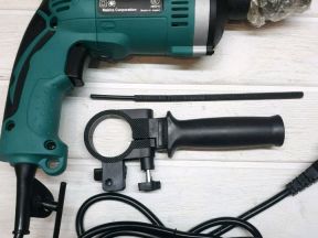 Дрель ударная Makita HP1630 710w