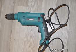 Ударная дрель Makita HP1621F