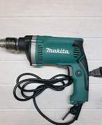 Дрель ударная Makita HP1630 710w