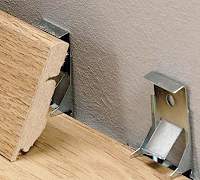 Клипсы для плинтусов Quick-Step Клипсы для плинтусов Quick-Step