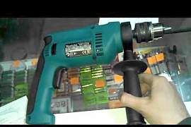 Ударная дрель Makita HP 1620