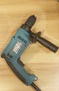 Ударная дрель Makita HP 1621 F