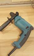 Ударная дрель Makita HP 1621 F